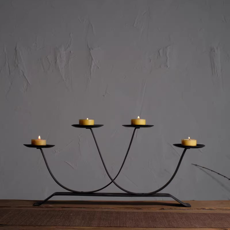 🌟 🌟Four curved metal candlesticks, featuring a typical retro industrial design