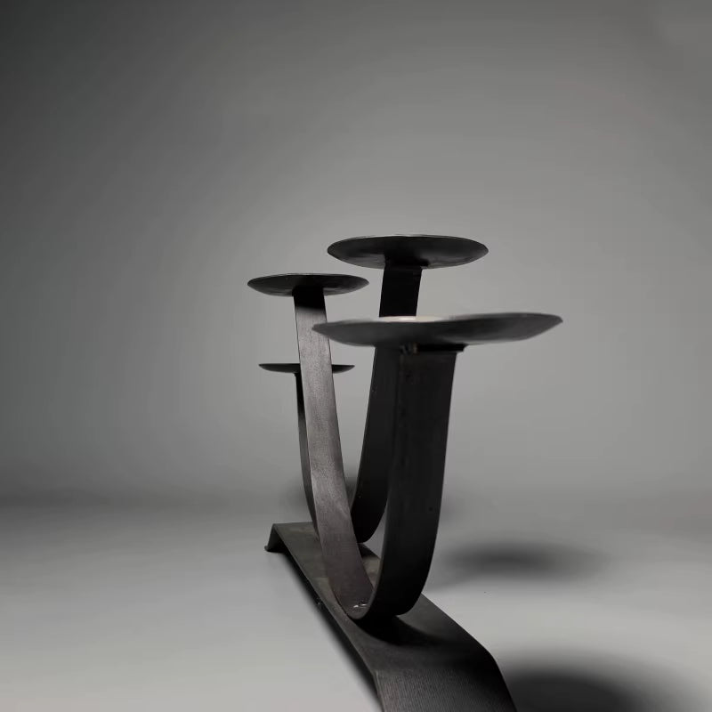 🌟 🌟Four curved metal candlesticks, featuring a typical retro industrial design